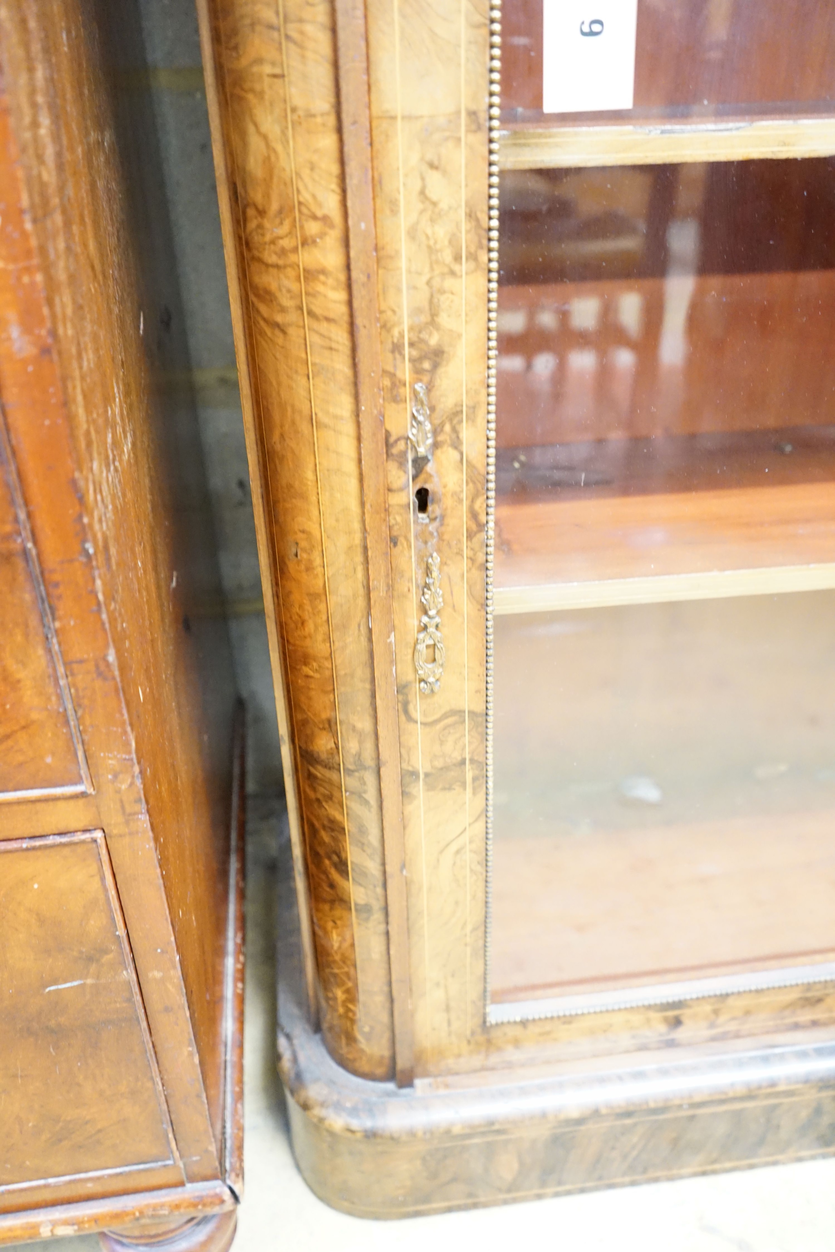 A Victorian inlaid gilt metal mounted figured walnut pier cabinet, width 84cm, depth 35cm, height 105cm